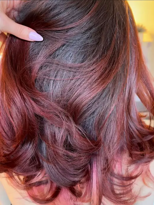 Deep red waves with dark roots